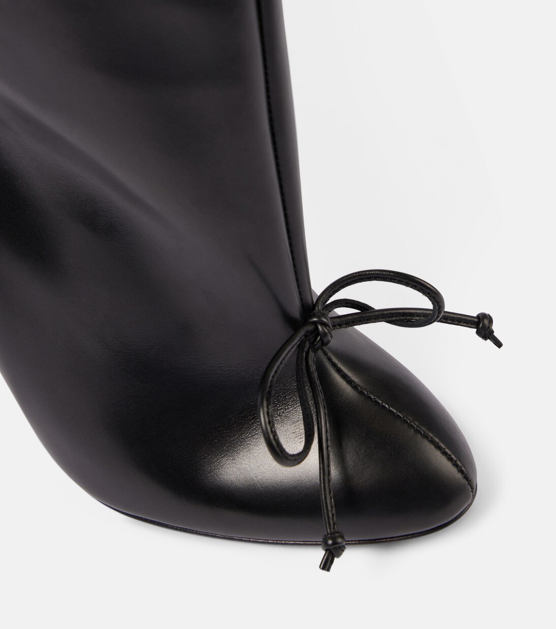 90 bow-detail leather ankle boots | Alaïa