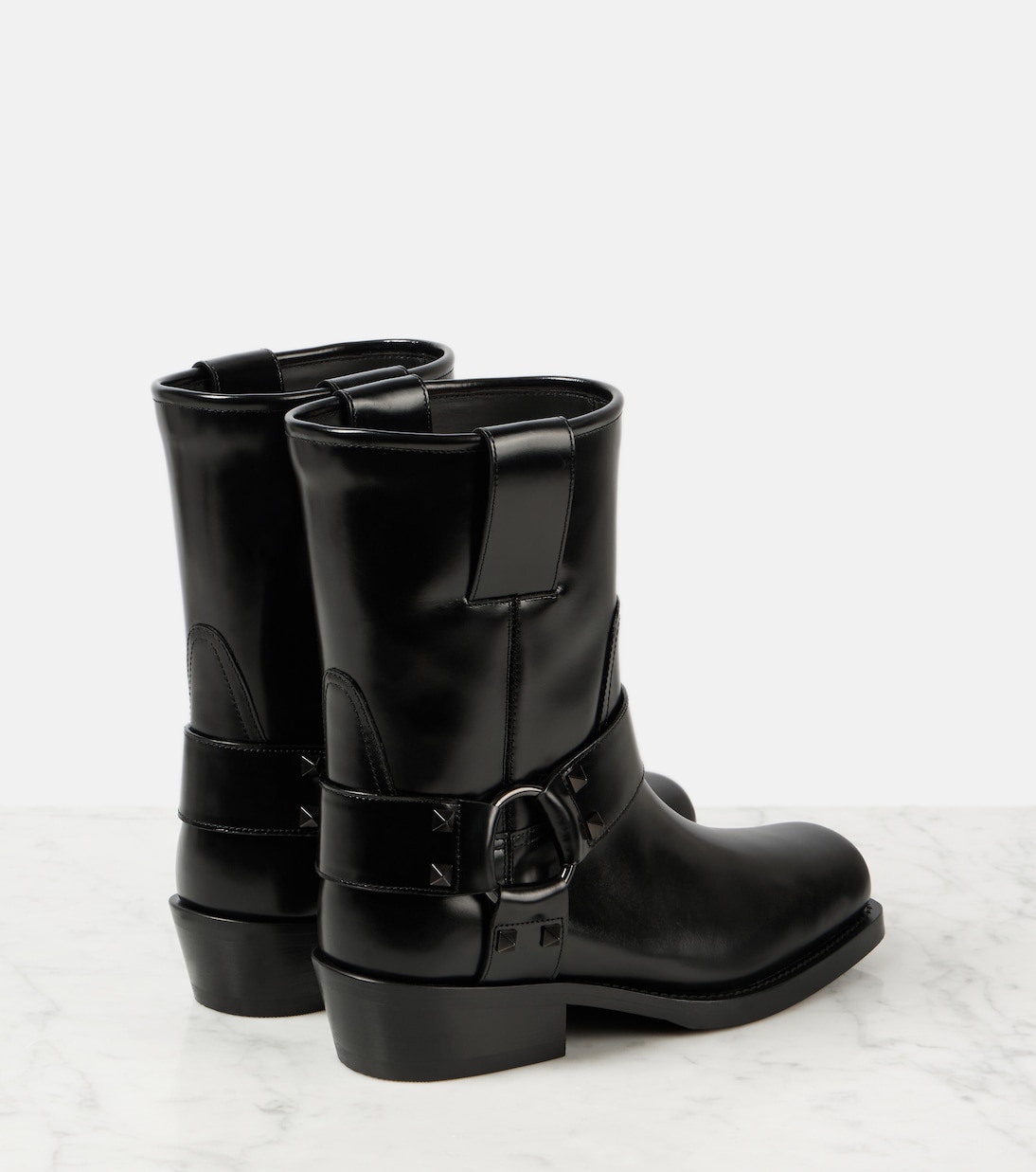 Rockstud leather biker boots | Valentino Garavani