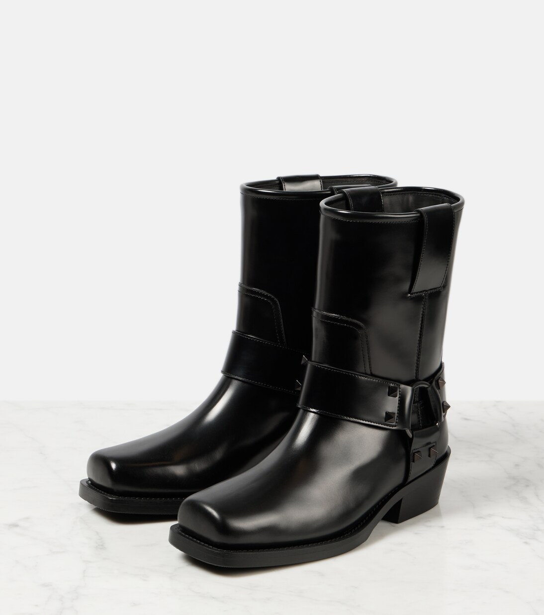 Rockstud leather biker boots | Valentino Garavani