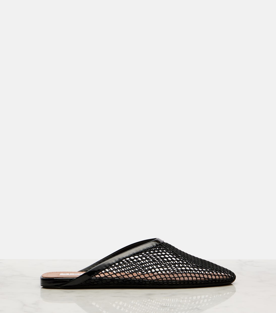 Patent leather-trimmed fishnet mules | Alaïa