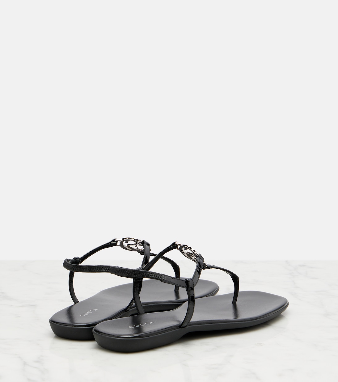 Interlocking G patent leather thong sandals | Gucci