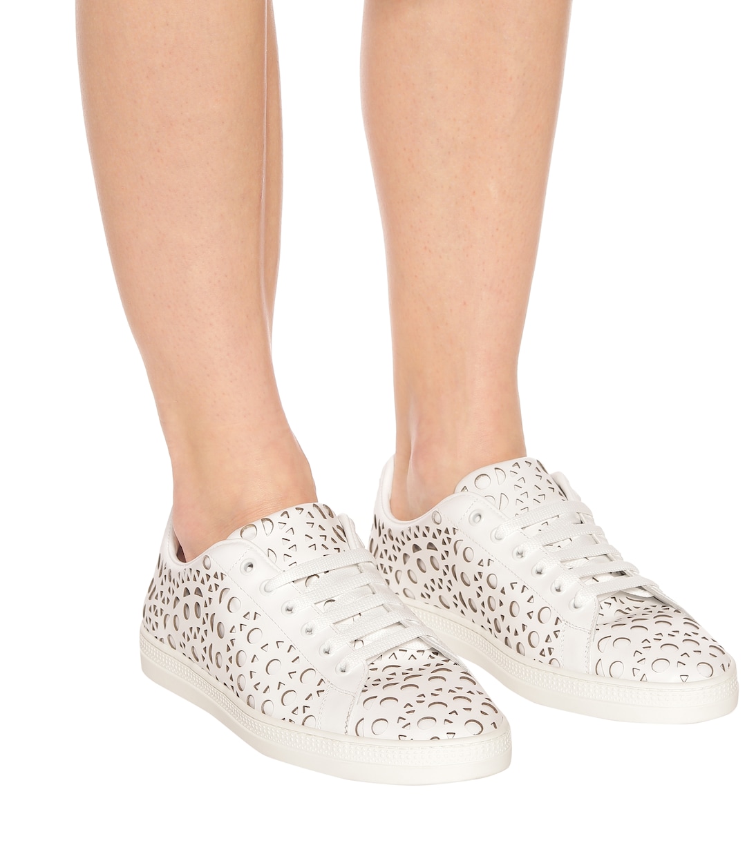 Laser-cut leather sneakers | Alaïa