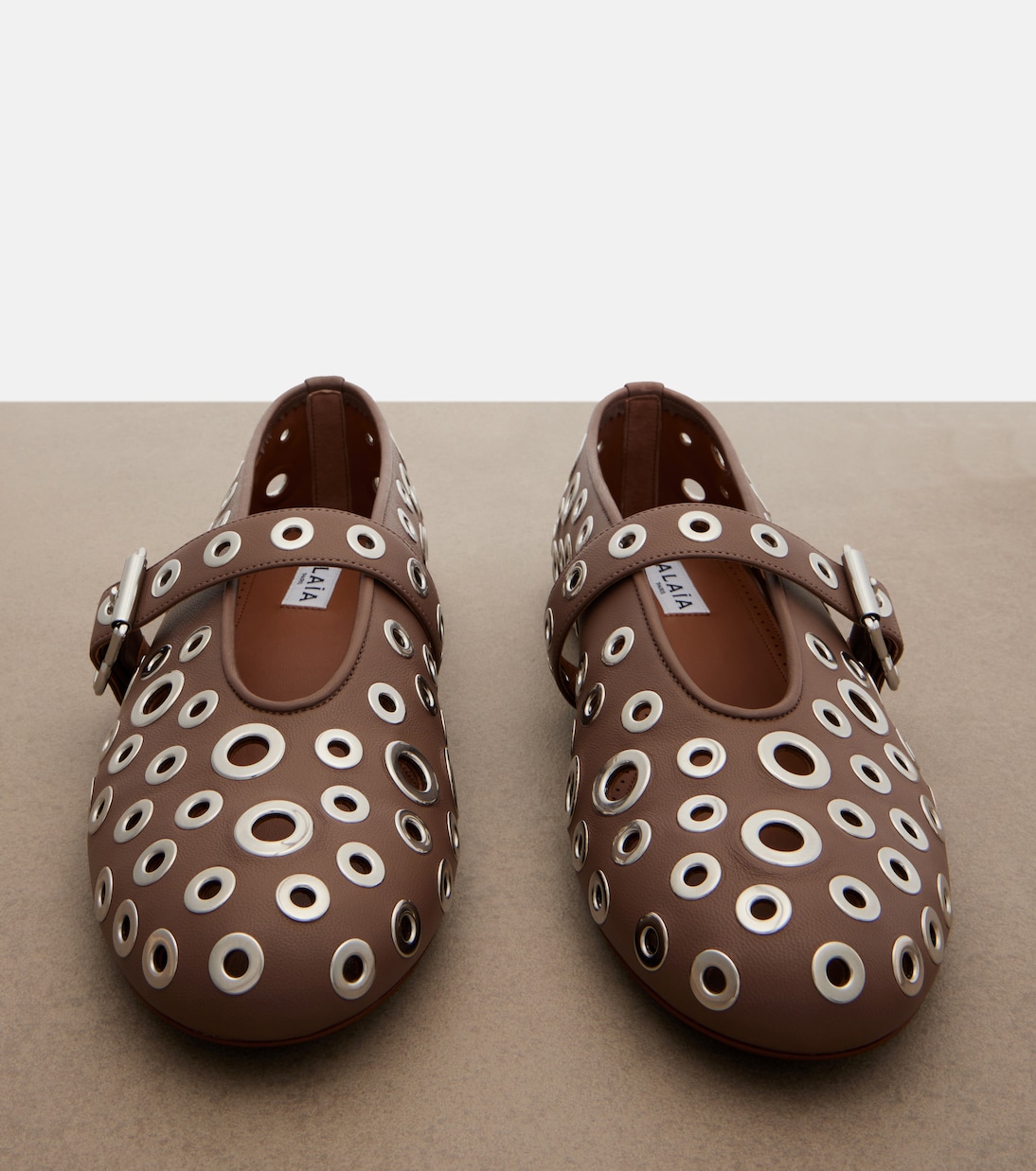 Ballerine in pelle con borchie | Alaïa