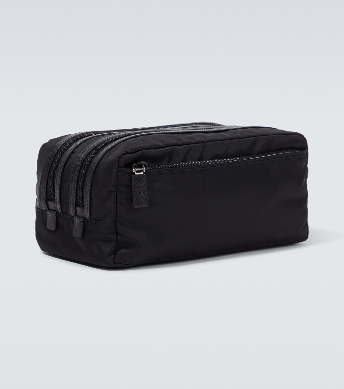 Re-Nylon leather-trimmed travel bag | Prada