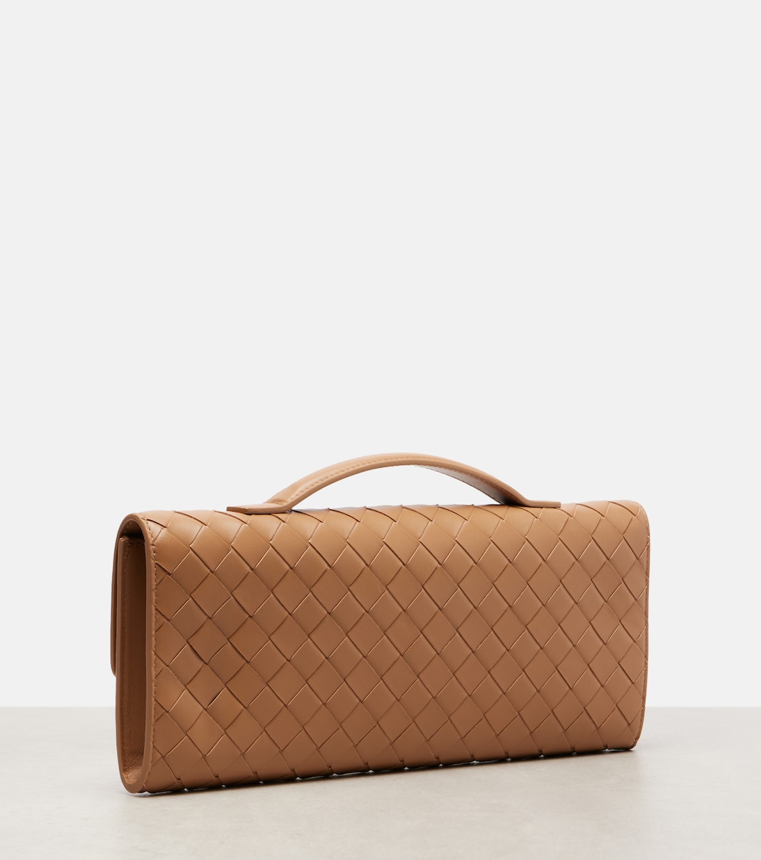 Andiamo Intrecciato leather clutch | Bottega Veneta