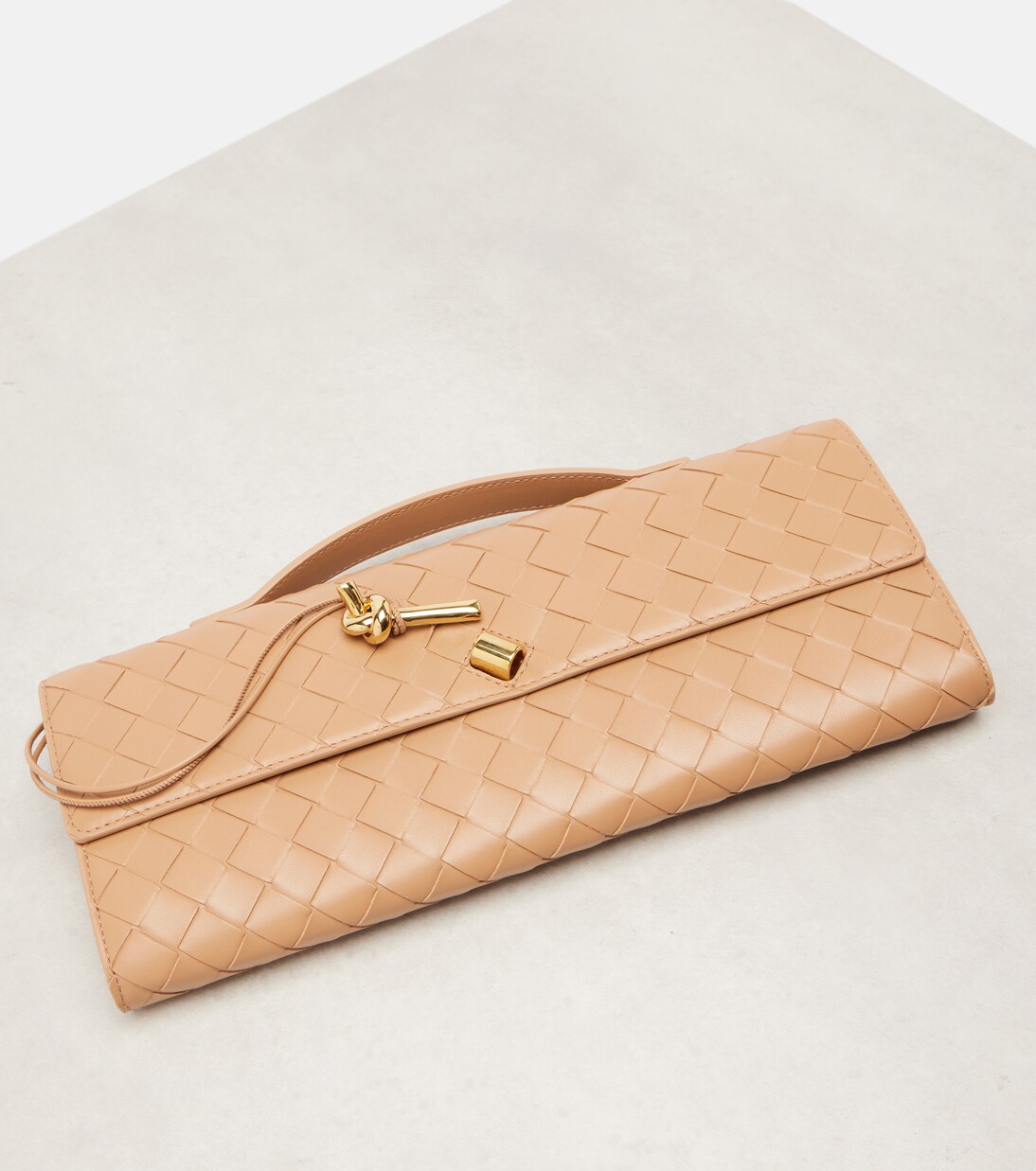 Andiamo Intrecciato leather clutch | Bottega Veneta