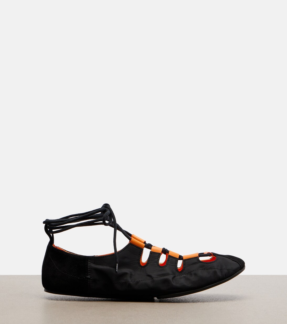 Suede-trimmed lace-up ballet flats | Alaïa