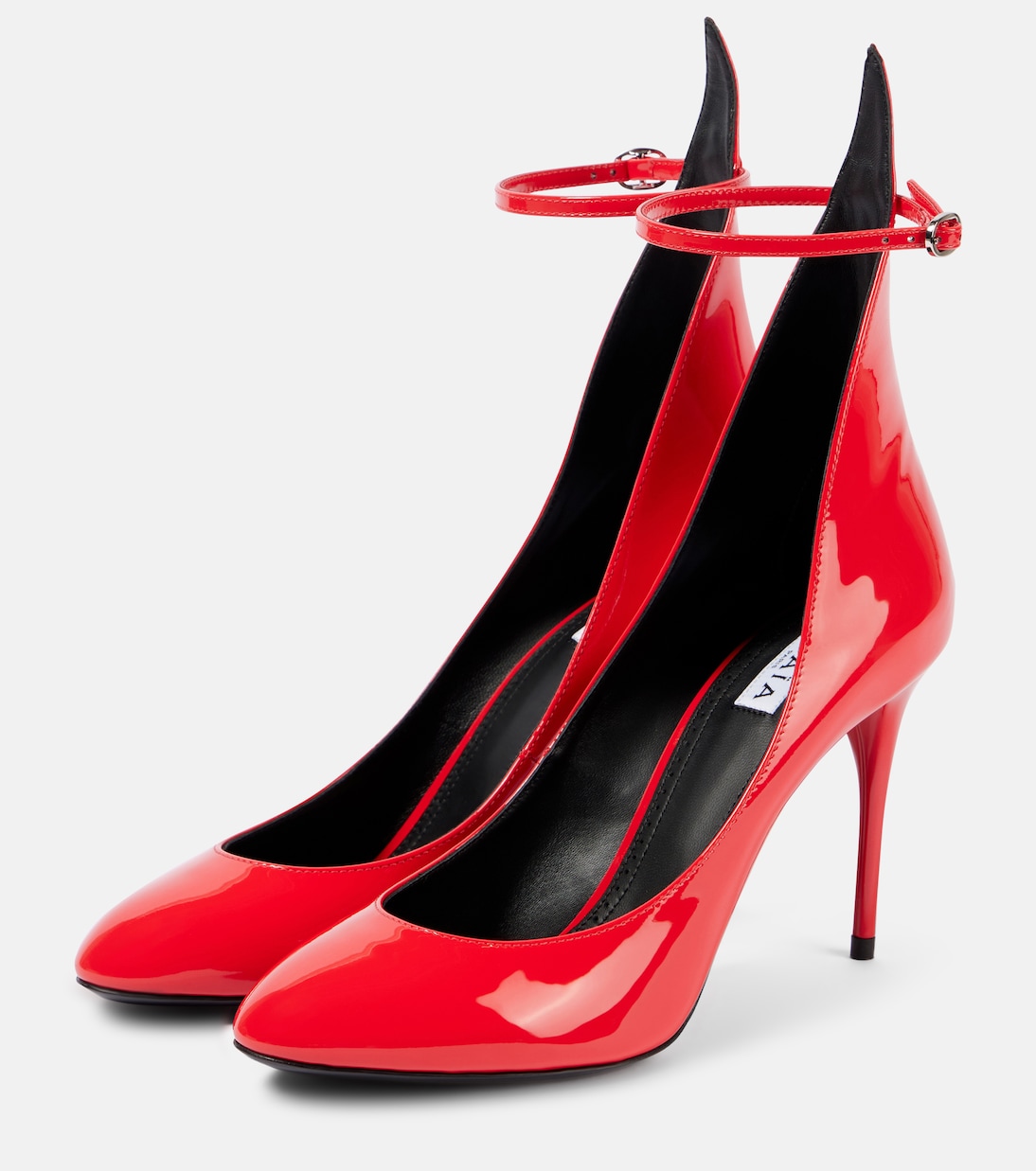 Decollete patent leather pumps | Alaïa