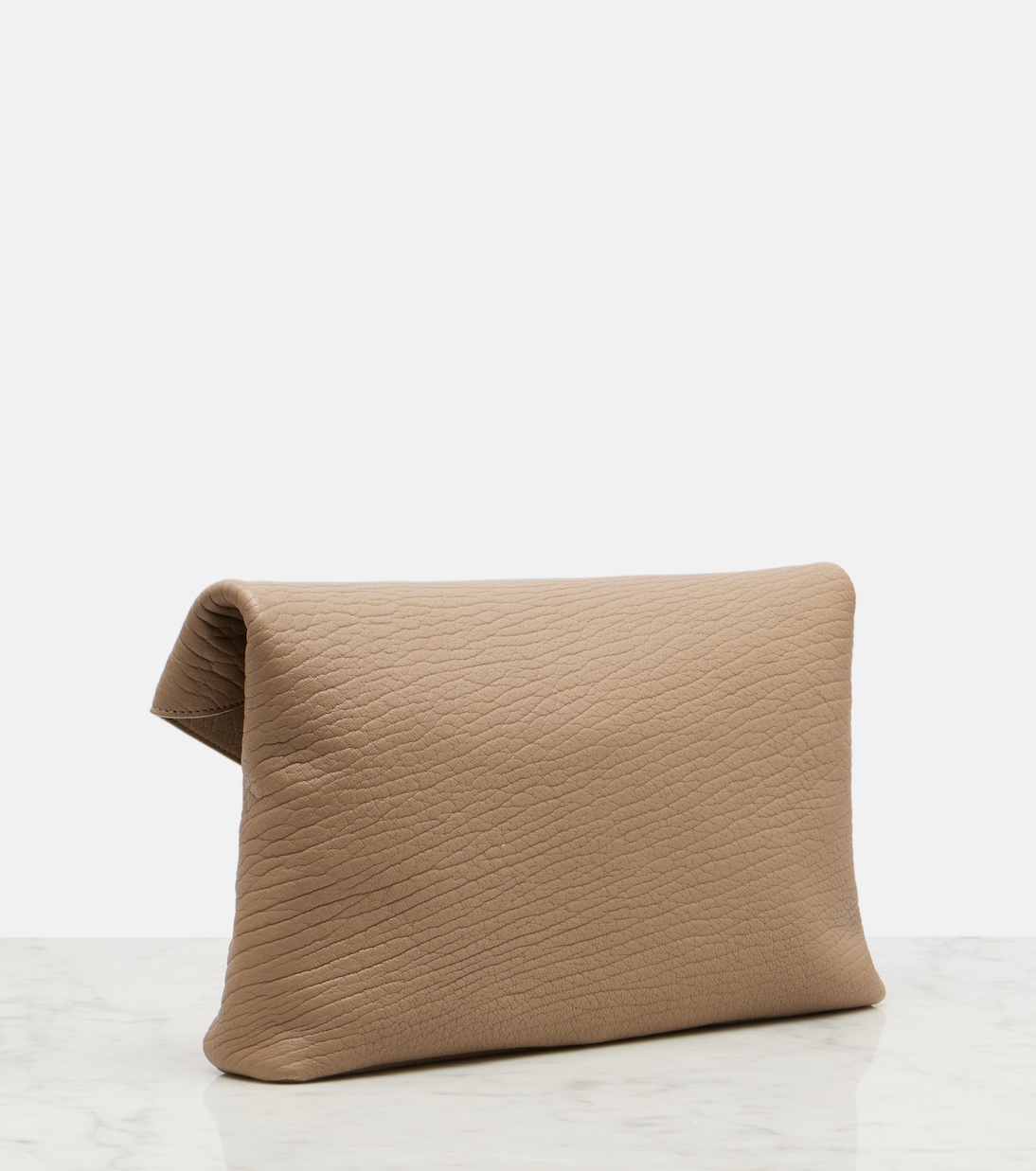 Cassandre Large leather clutch | Saint Laurent