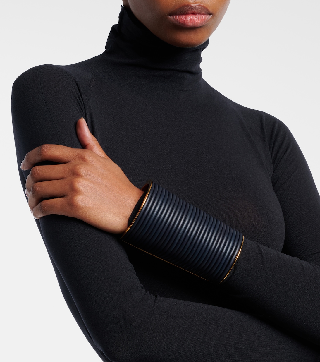 Leather-trimmed cuff bracelet | Alaïa
