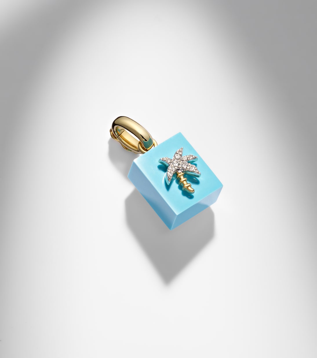 Set aus einzelnem Ohrring Palmier aus 9kt Gelbgold und Diamanten und Anhänger Le Cubo mit Türkis | Yvonne Léon