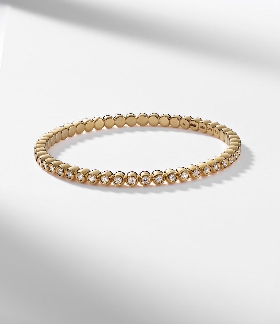 Stretchy 18kt gold bracelet with diamonds | Bucherer Fine Jewellery