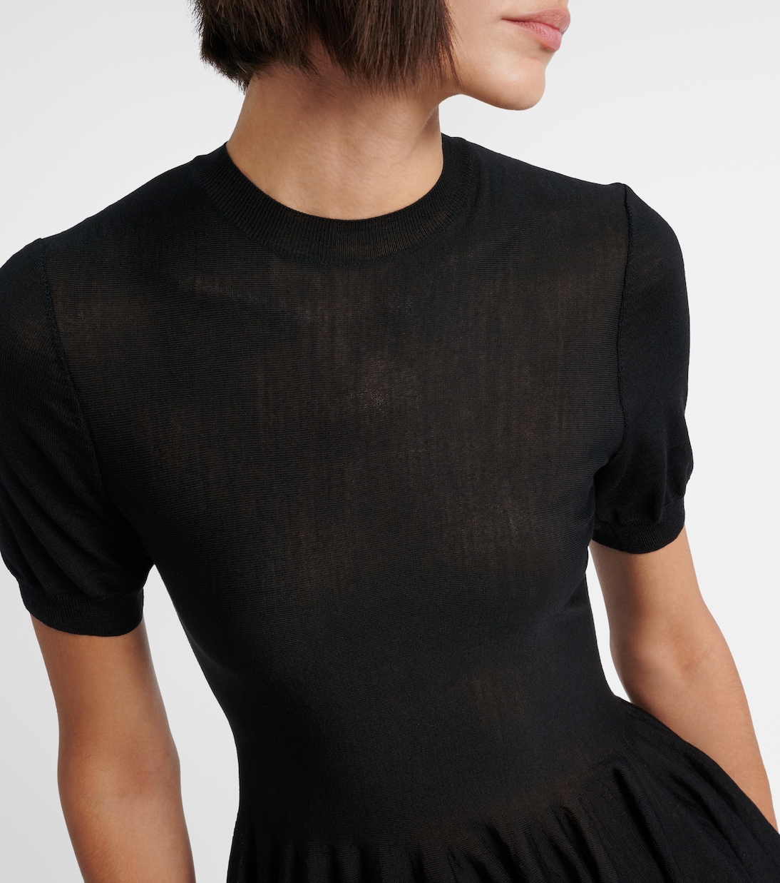 Top in lana vergine con peplo | Alaïa