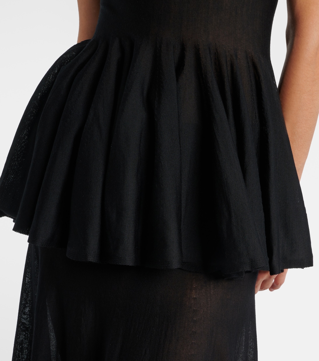 Top in lana vergine con peplo | Alaïa