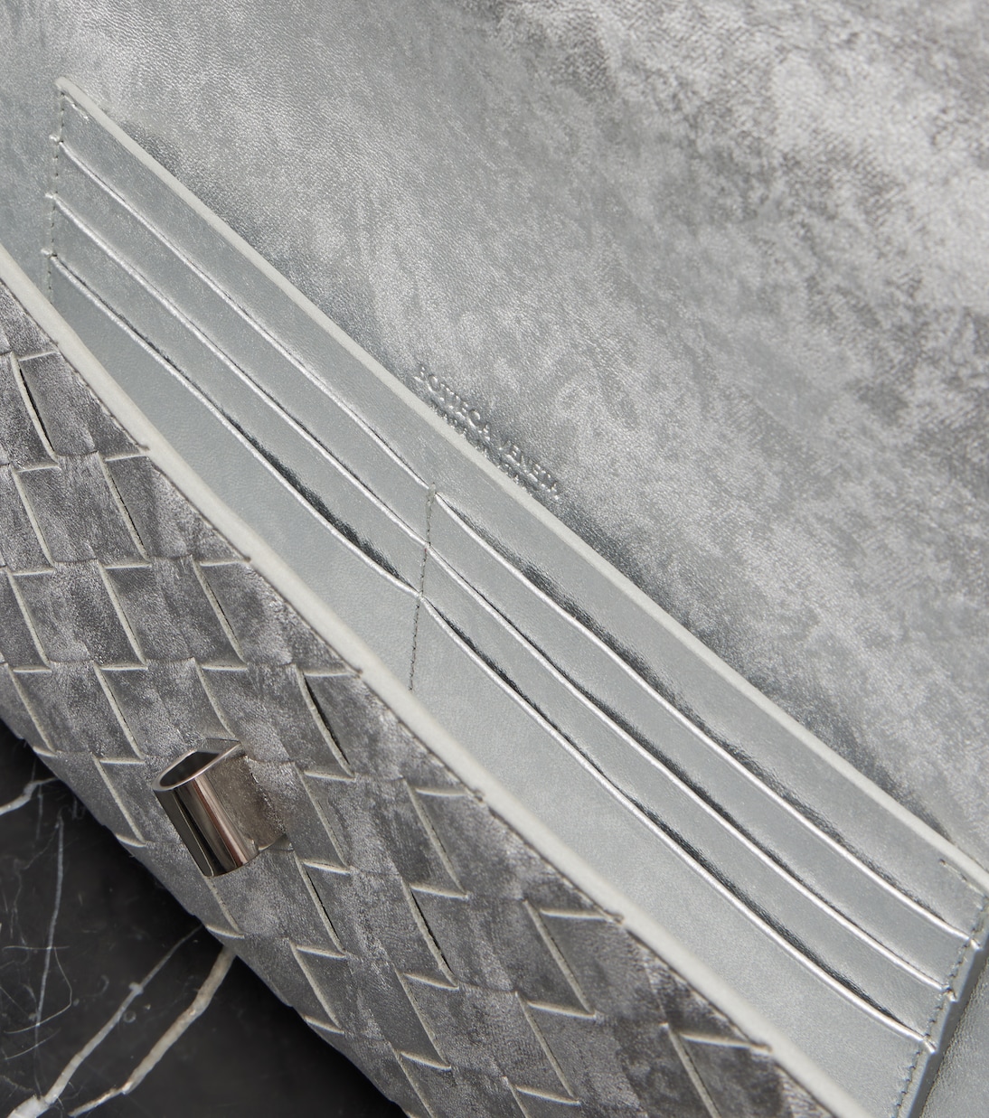 Andiamo Intrecciato metallic leather clutch | Bottega Veneta