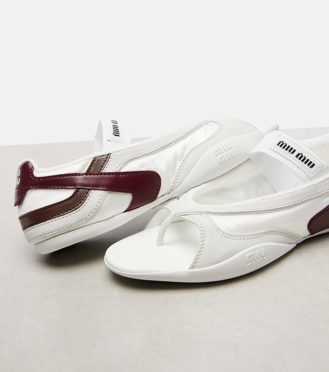 Gymnasium leather-trimmed thong sandals | Miu Miu