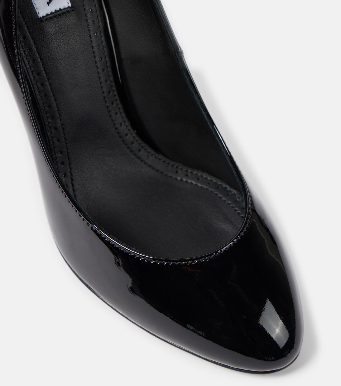 Patent leather pumps | Alaïa