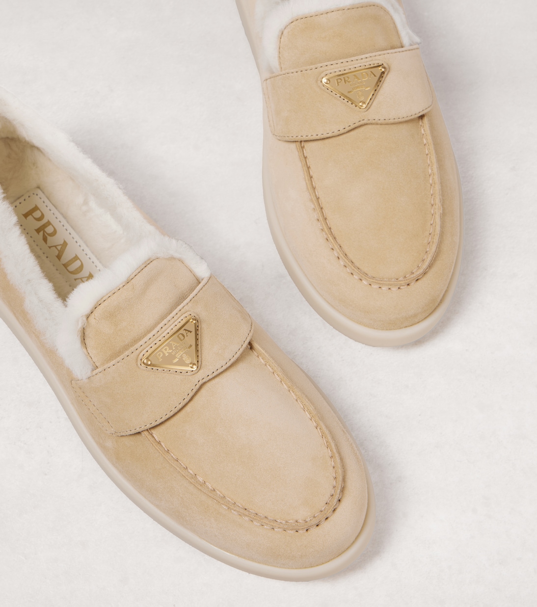 Shearling-lined suede loafers | Prada