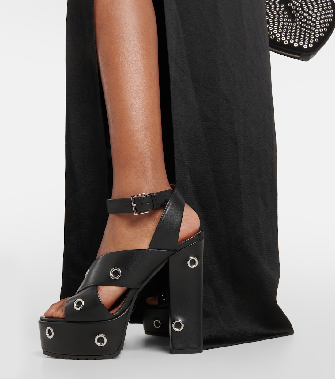 Eyelet-embellished leather sandals | Alaïa