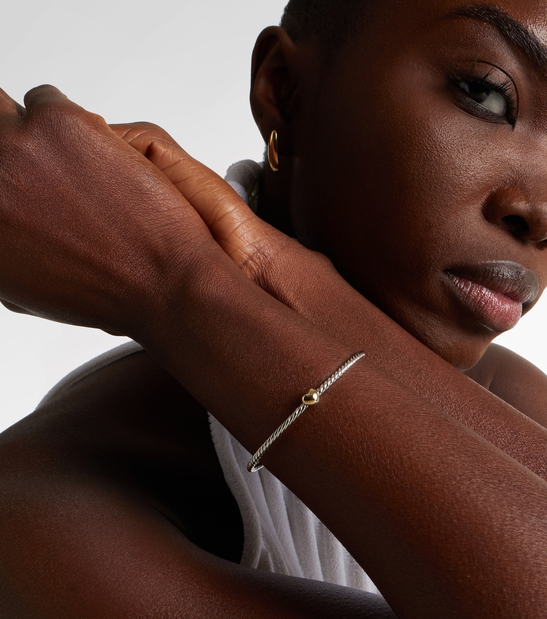 Bracciale Micro Cable Flex® Heart Station in oro 14kt (585/1000) e argento sterling (925) | David Yurman