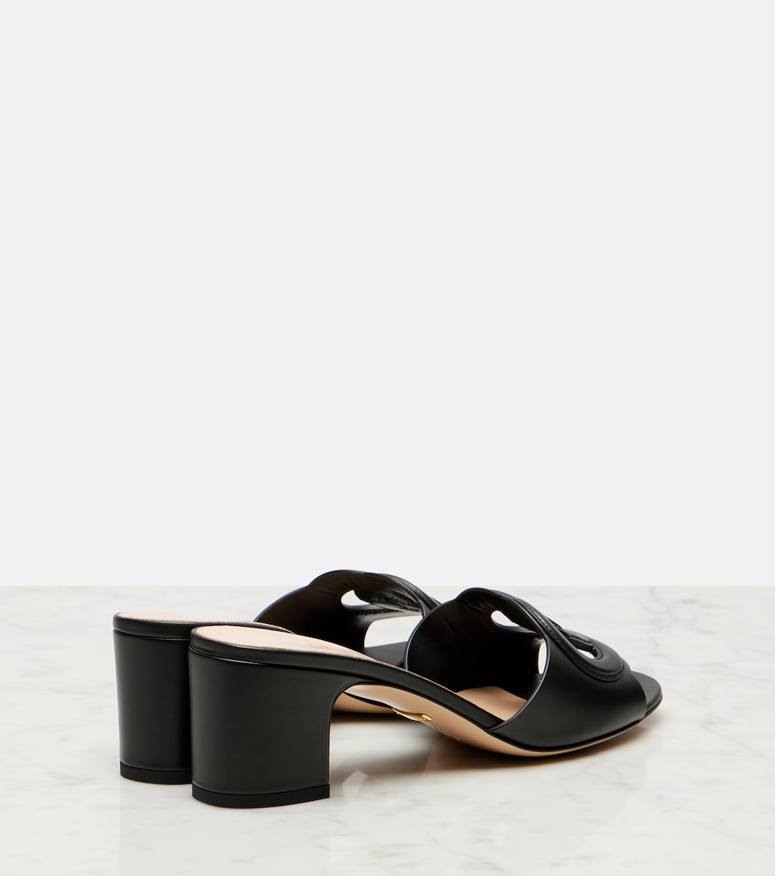 Interlocking G leather mules | Gucci