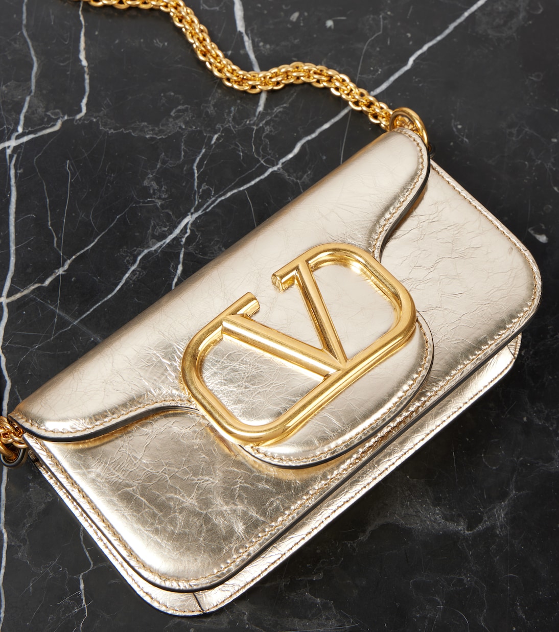 Locò Small metallic leather shoulder bag | Valentino Garavani