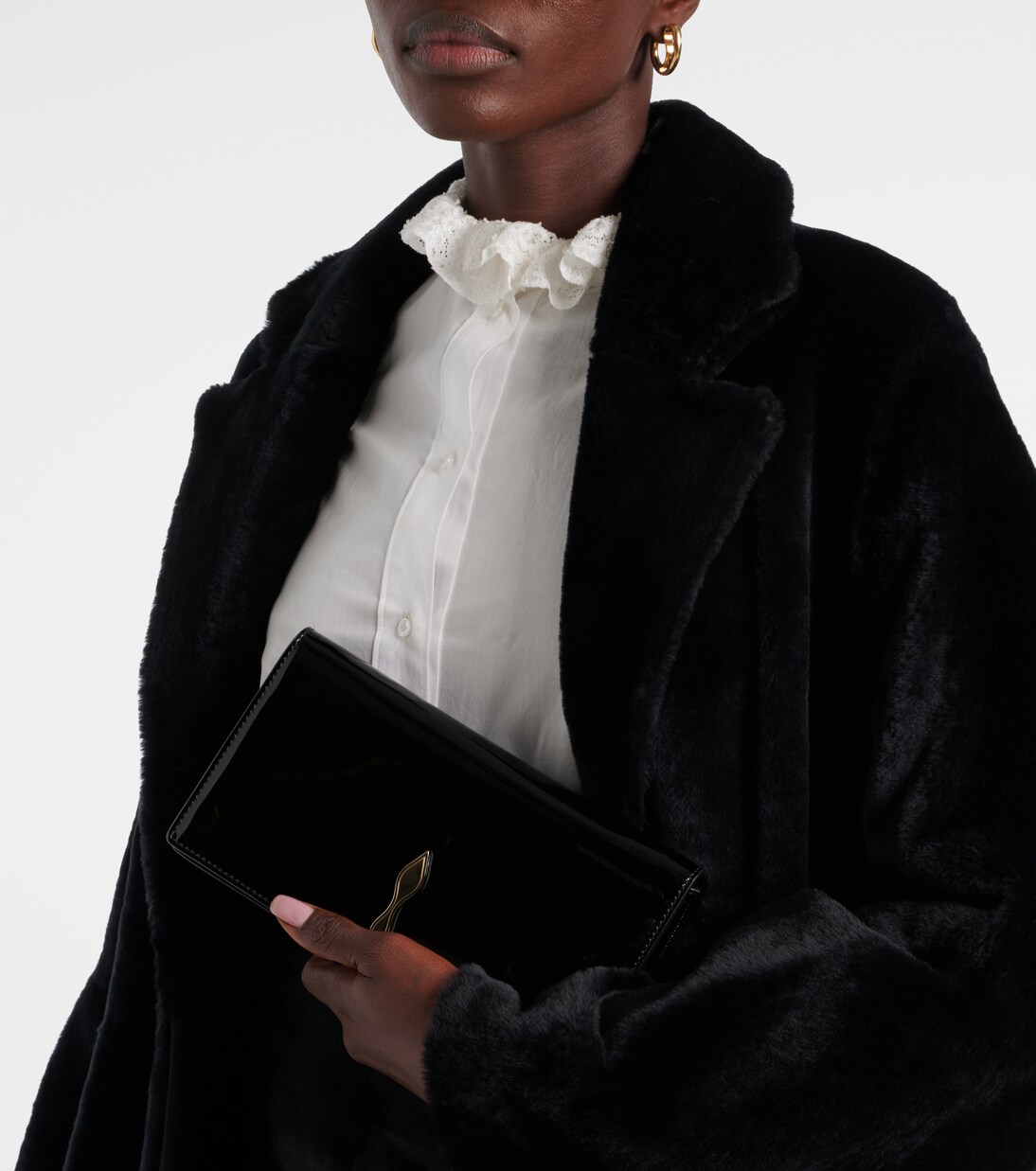 Bettina Small patent leather clutch | Christian Louboutin