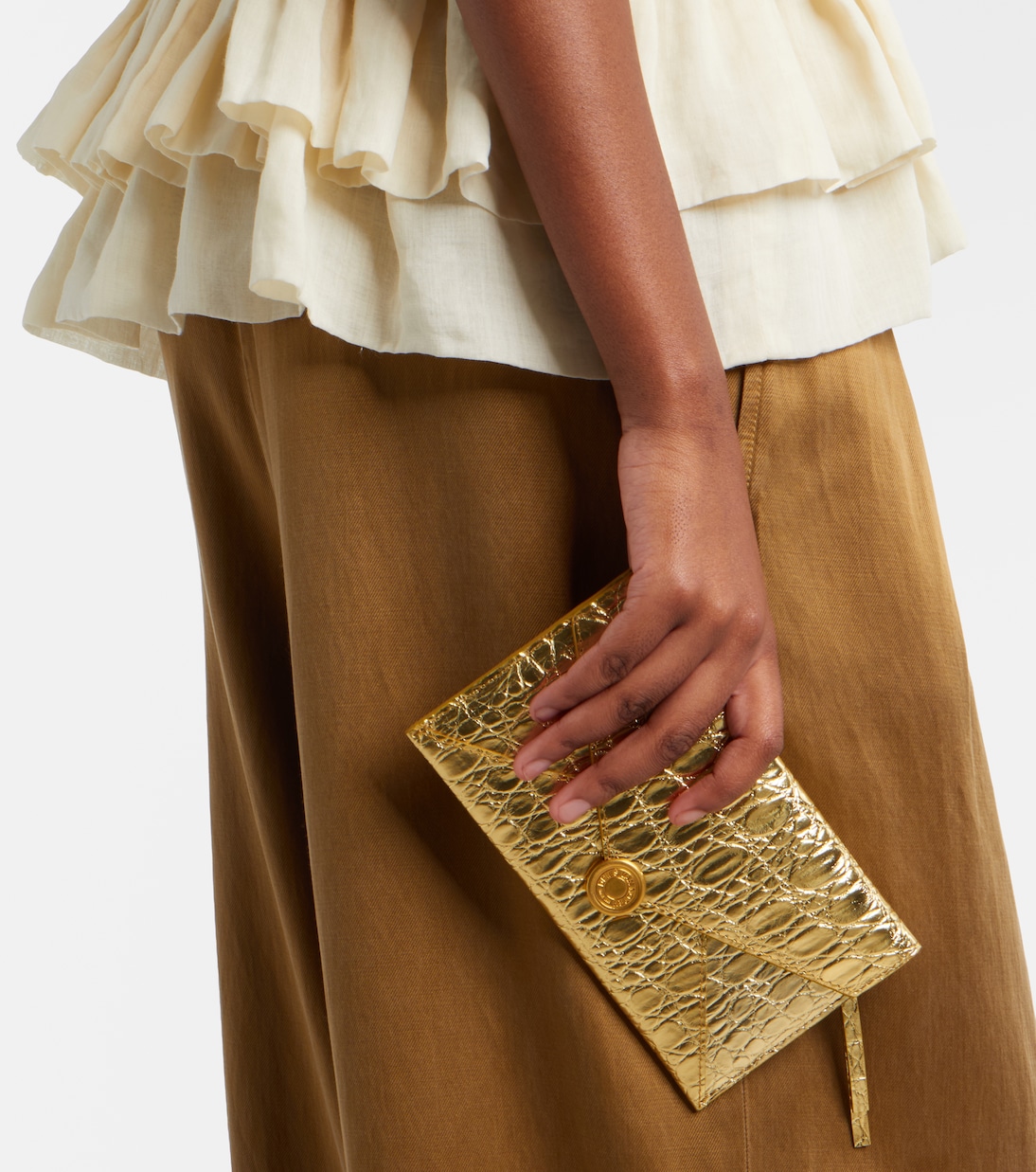 Clutch in pelle metallizzata goffrata | Dries Van Noten