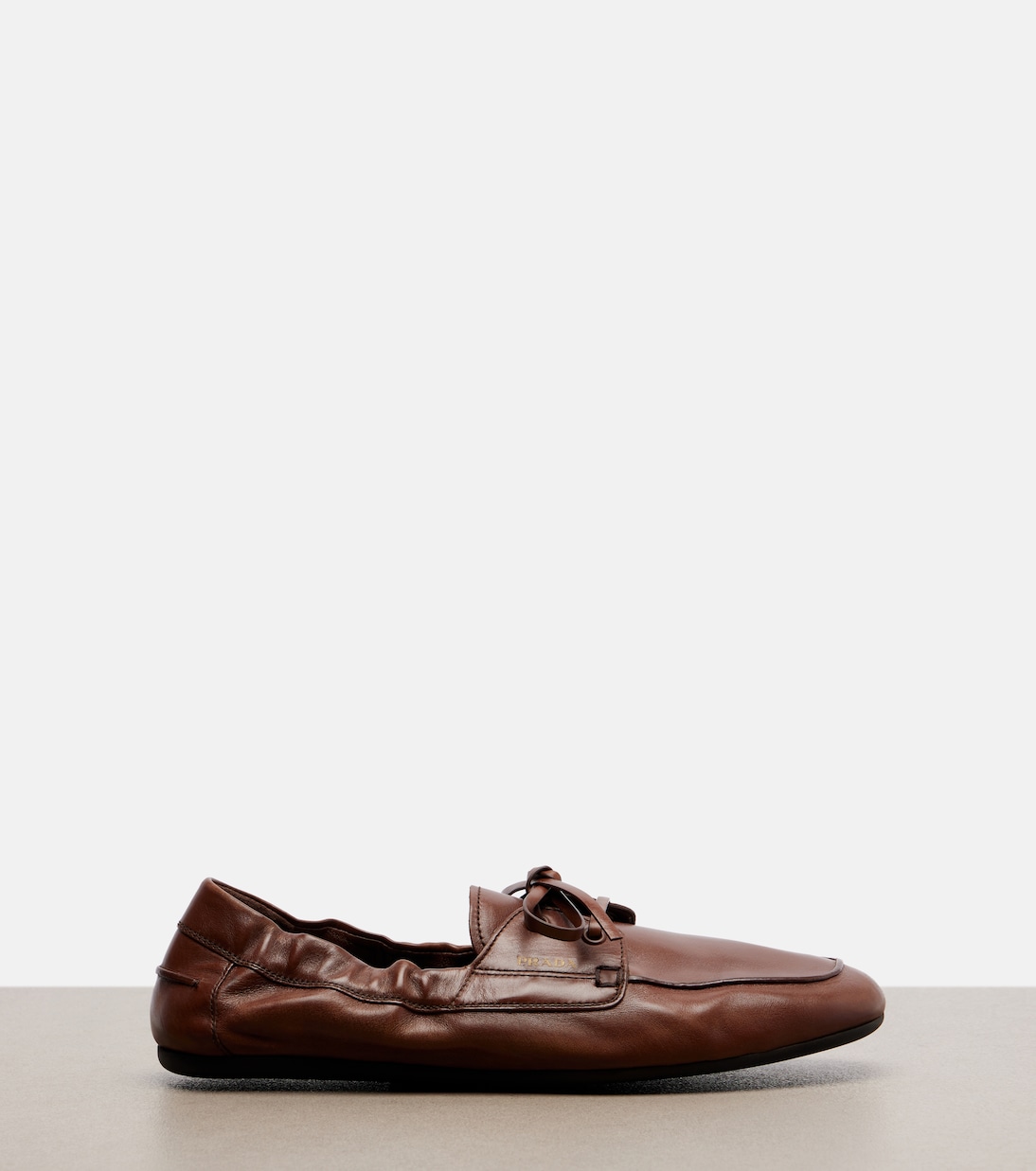 Shuffle leather boat shoes | Prada