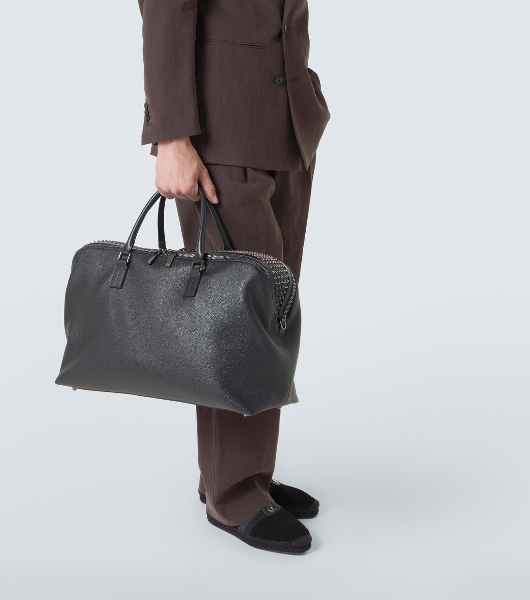 Funky studded leather duffel bag | Christian Louboutin