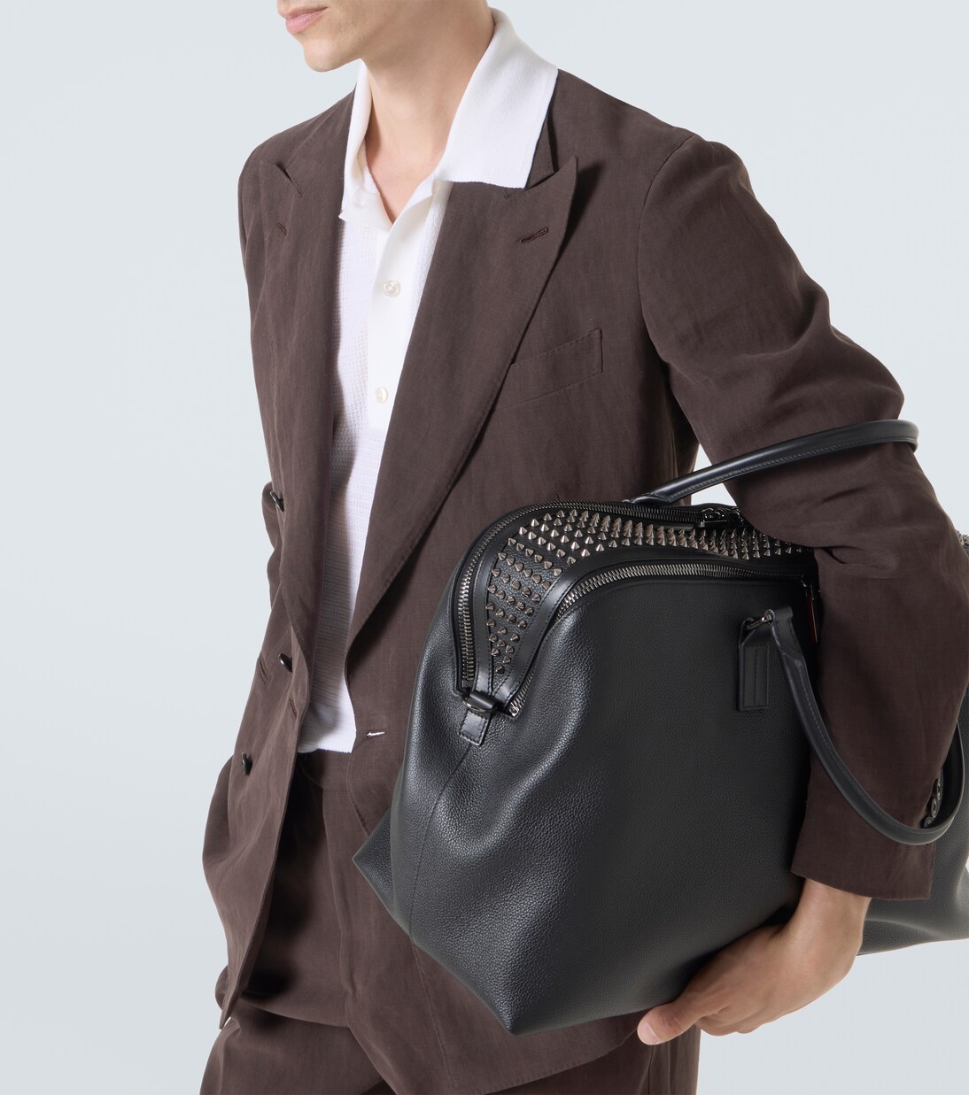 Funky studded leather duffel bag | Christian Louboutin