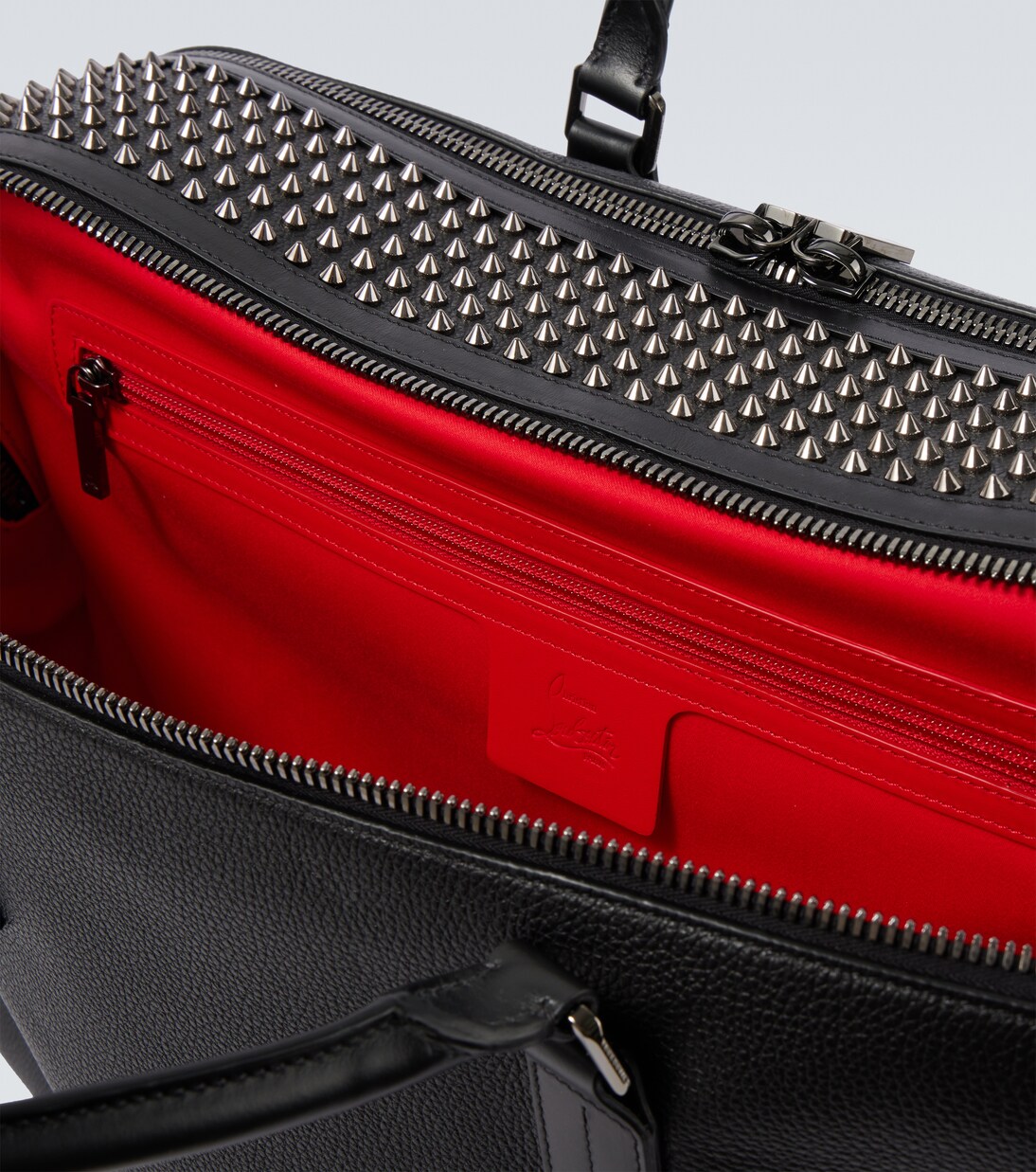 Funky studded leather duffel bag | Christian Louboutin