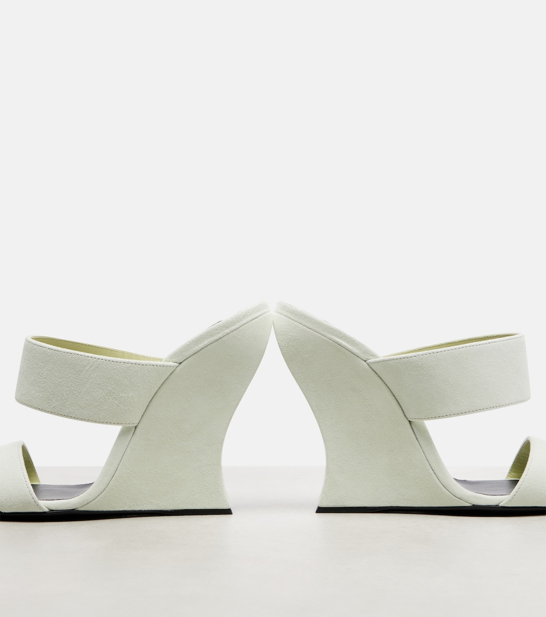 Mules compensées Wave 110 en daim | Alaïa