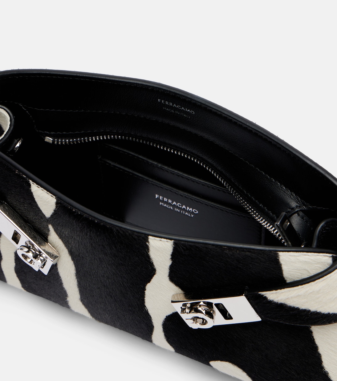 Bedruckte Clutch Hug aus Kalbshaar | Ferragamo