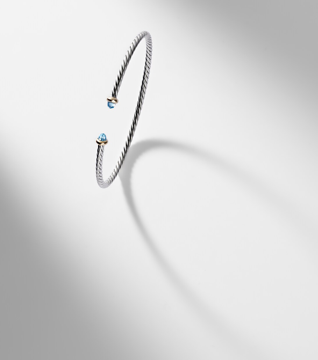 Micro Cable Flex® sterling silver and 14kt gold cuff bracelet with topaz | David Yurman