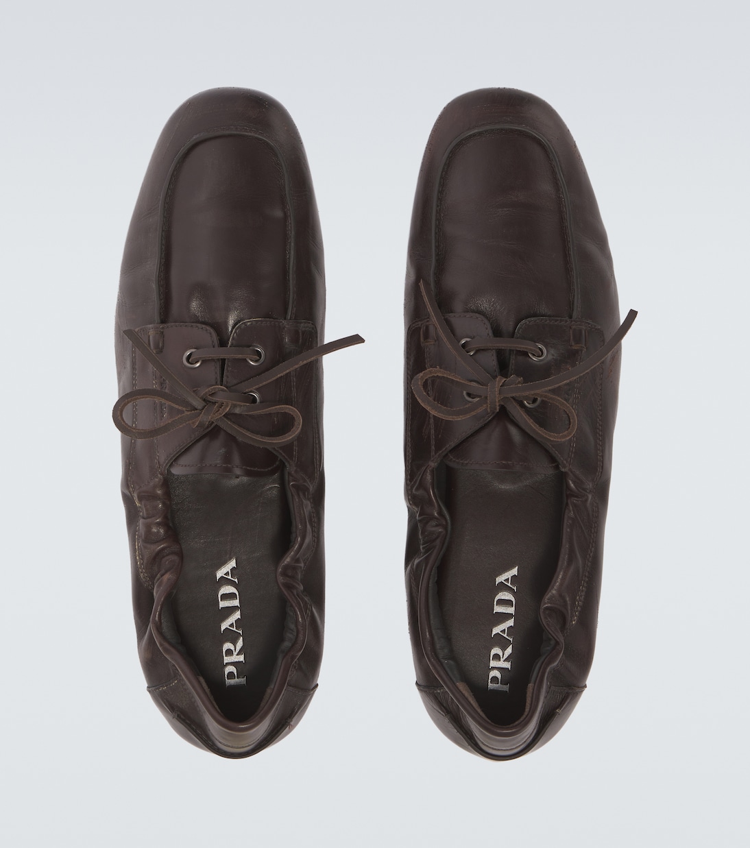 Shuffle leather boat shoes | Prada
