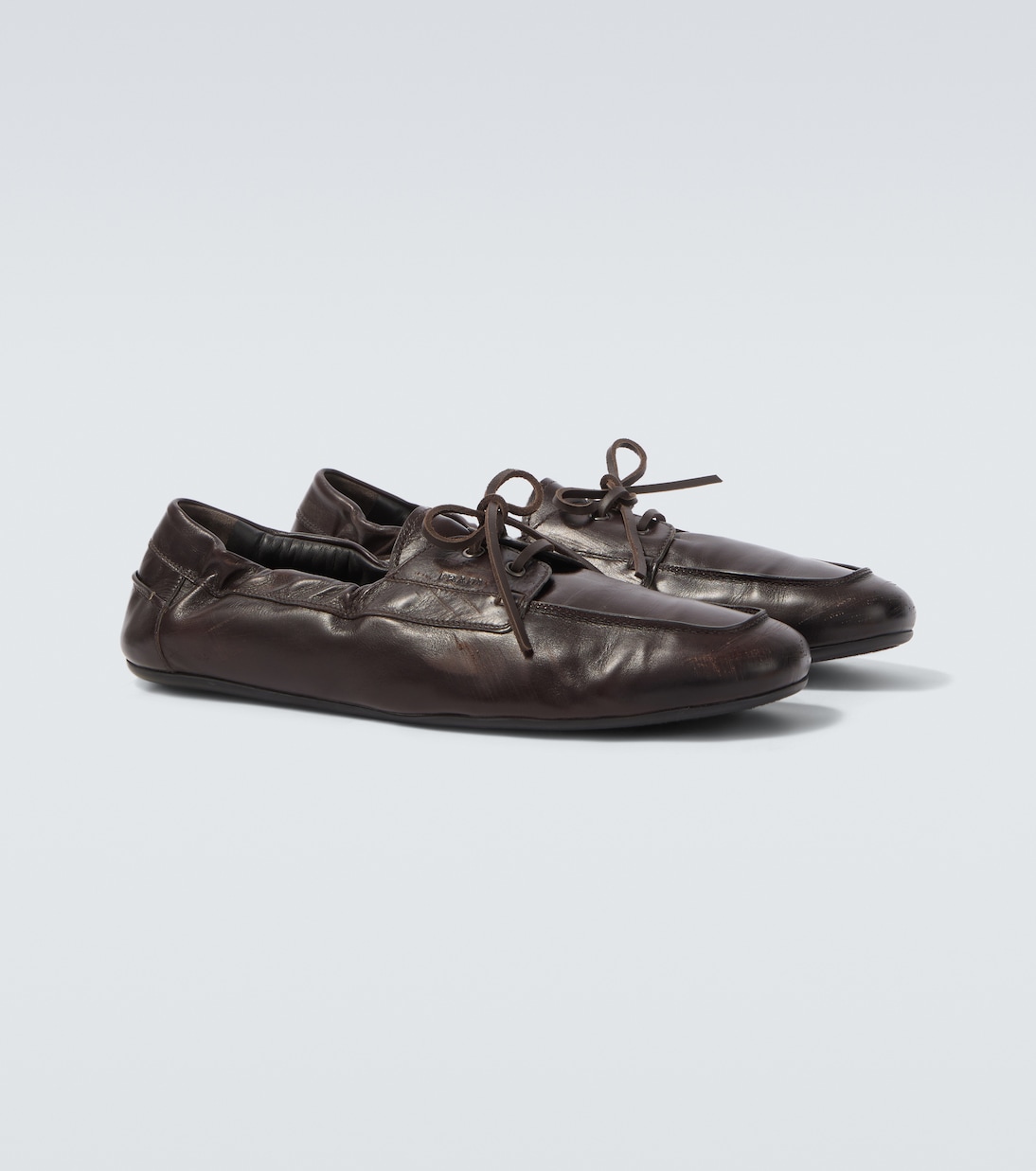 Shuffle leather boat shoes | Prada
