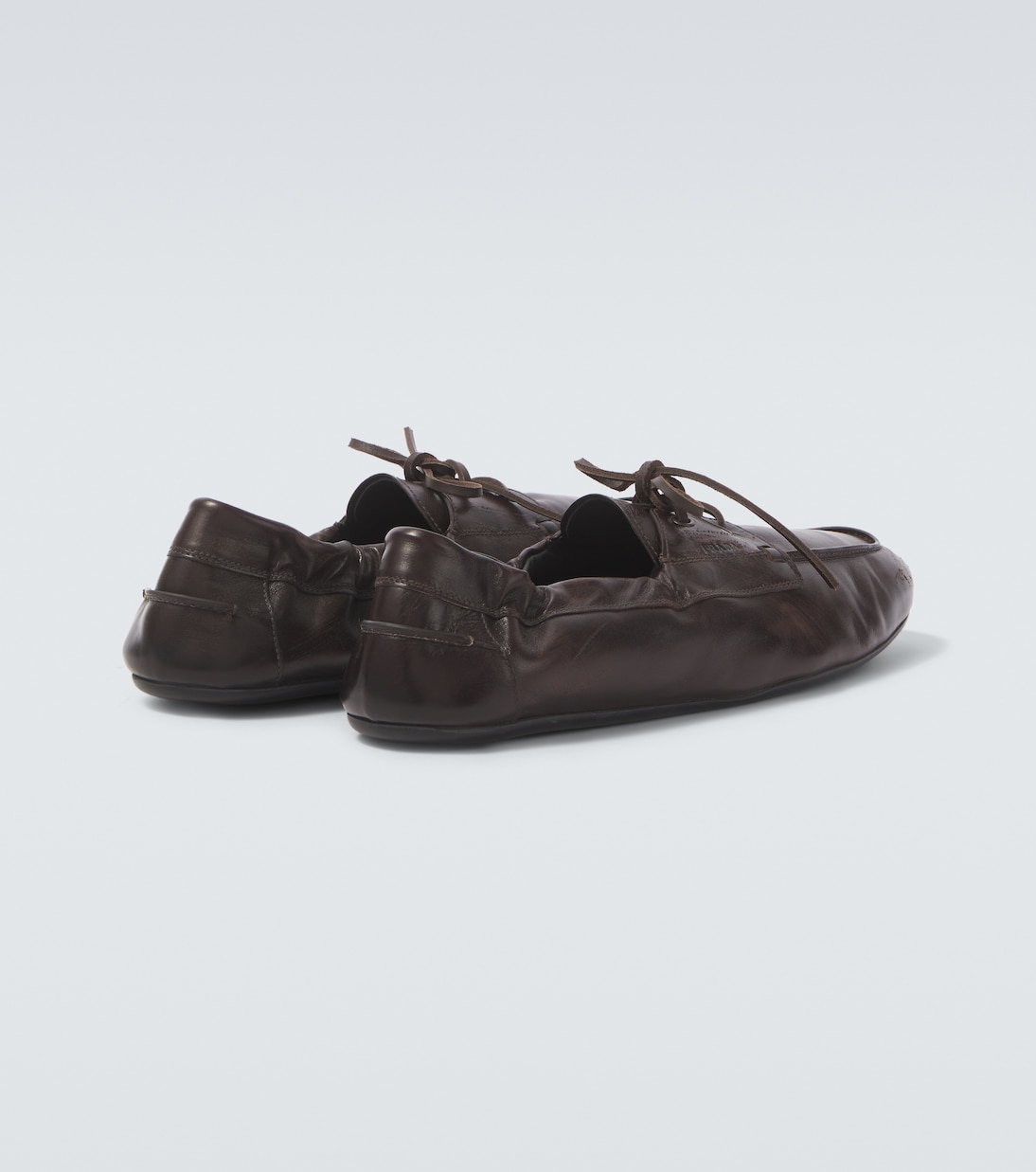 Shuffle leather boat shoes | Prada