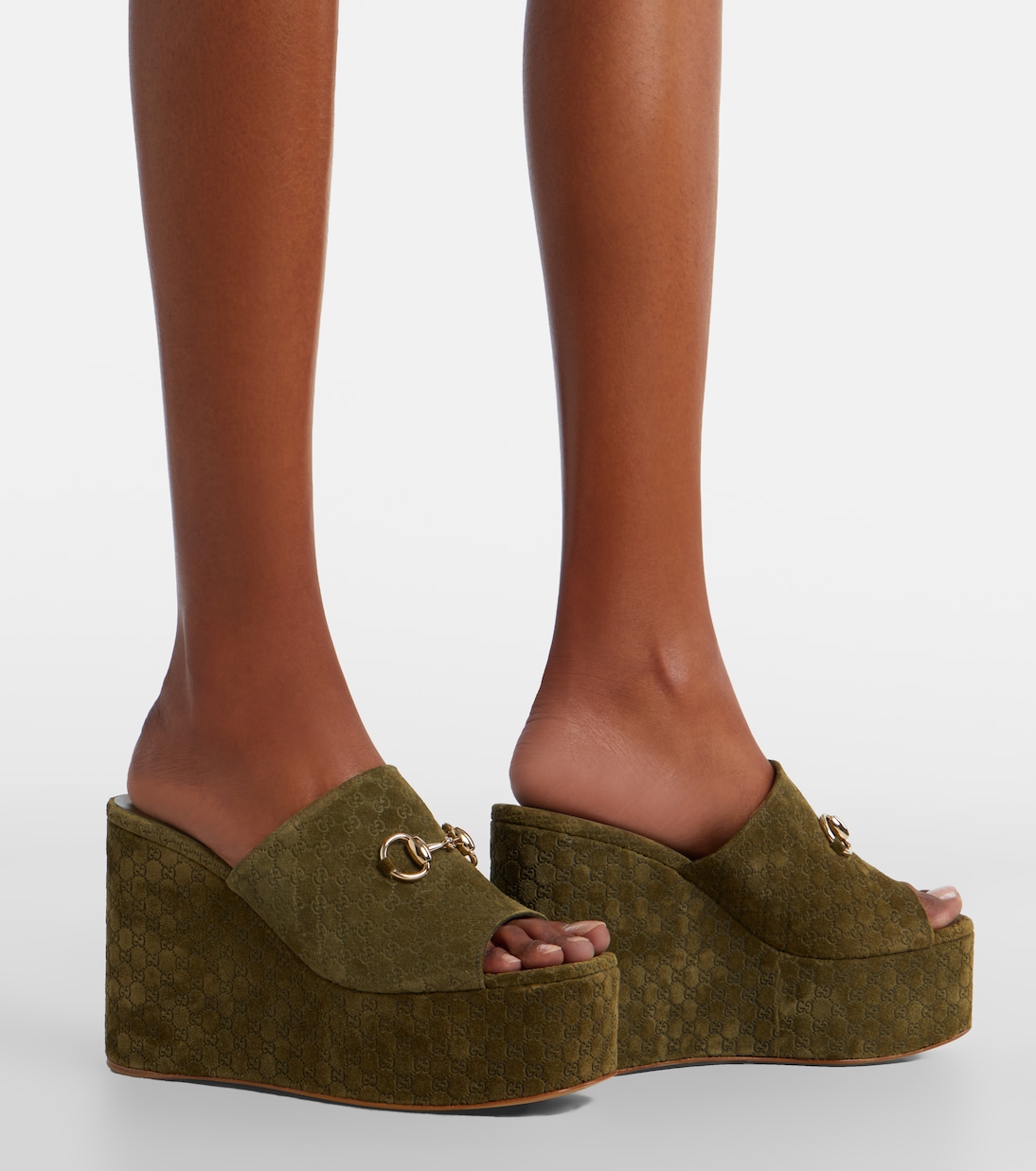 Mules compensées Horsebit GG en daim | Gucci