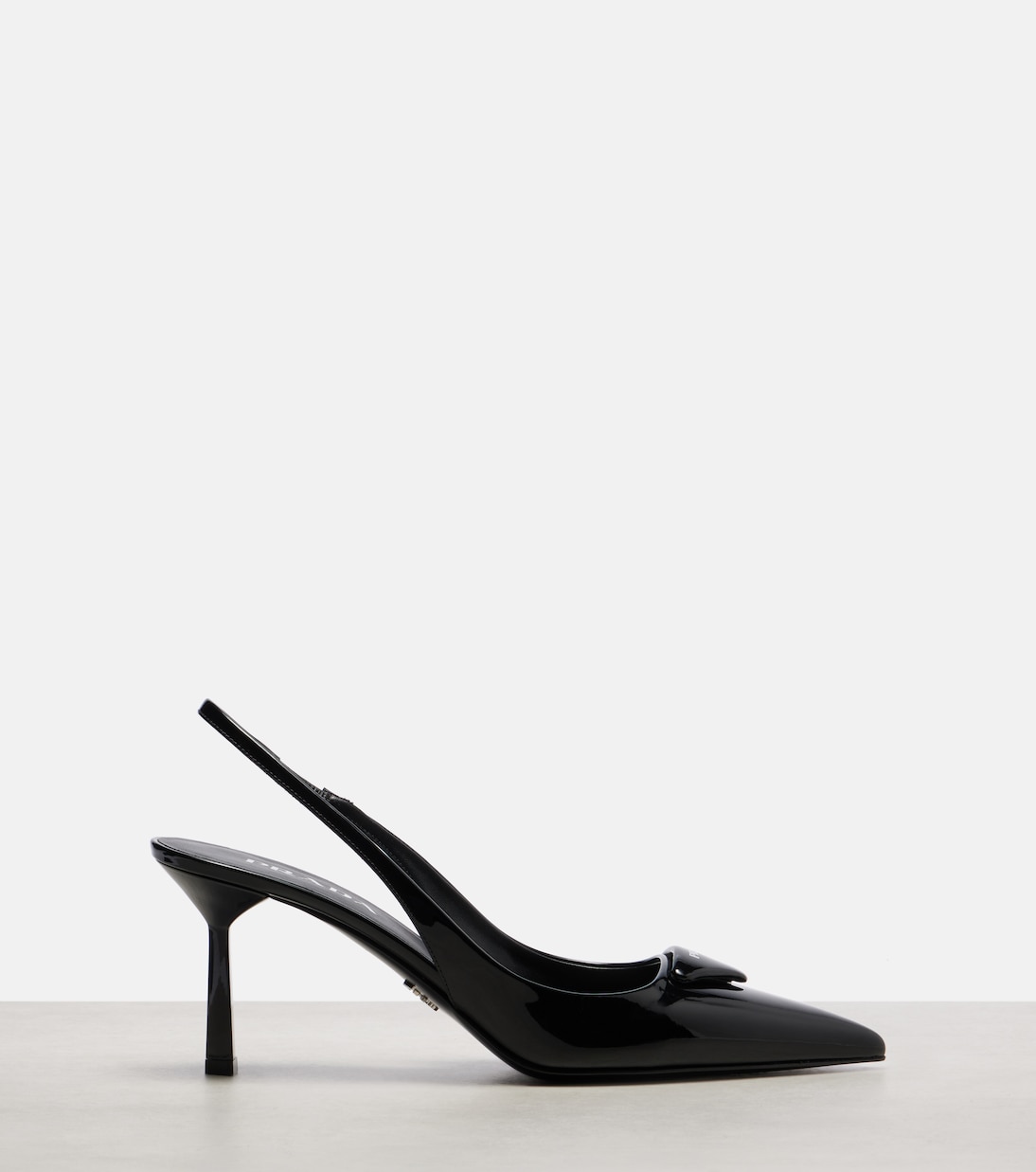 Patent leather slingback pumps | Prada