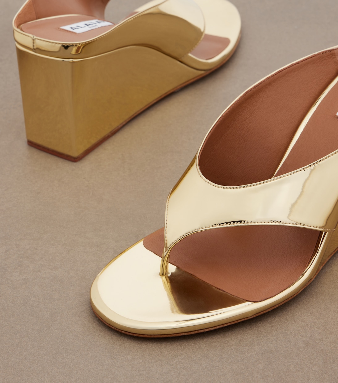 Cube metallic wedge thong sandals | Alaïa