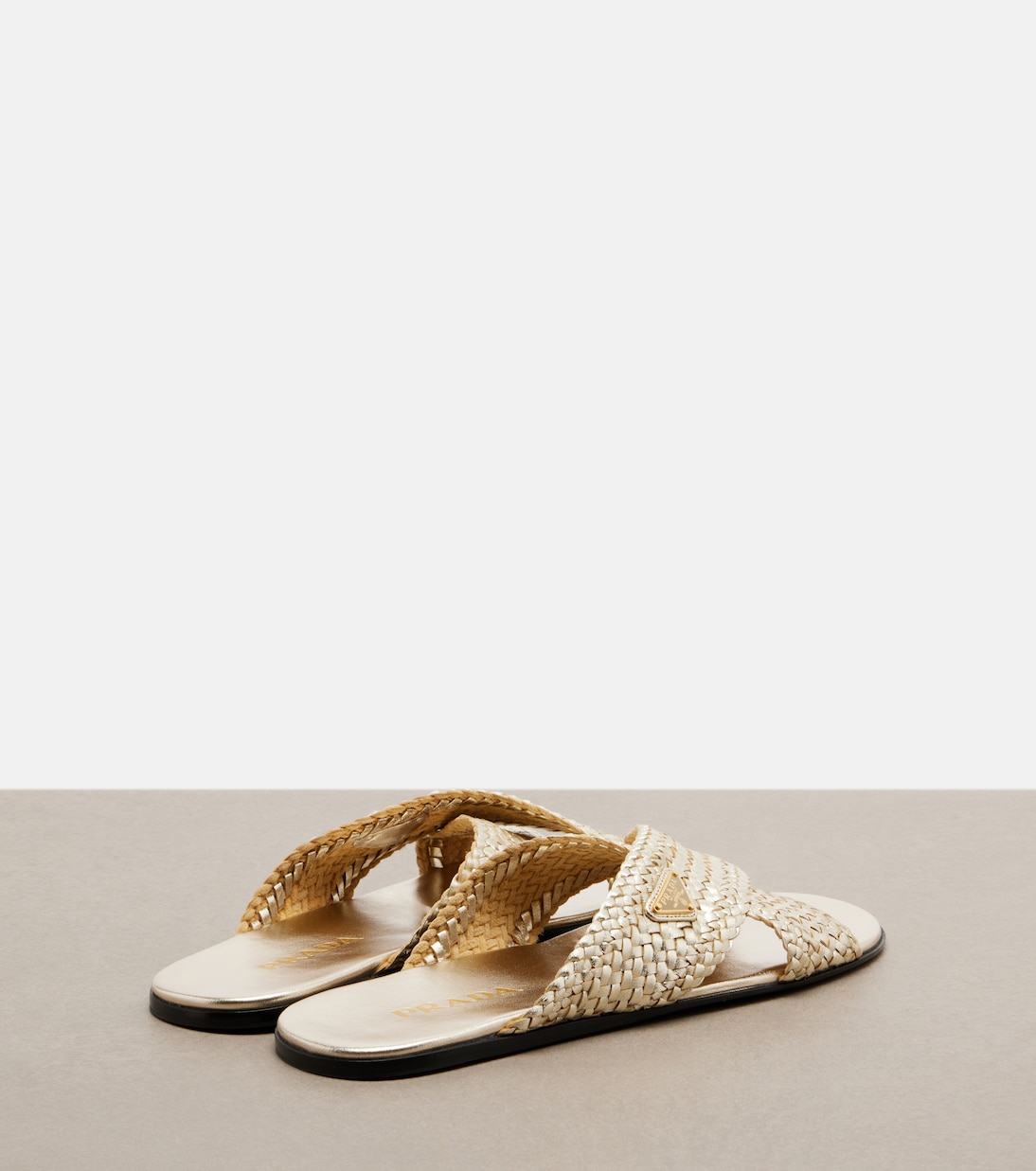 Pantoletten Woven aus Leder | Prada