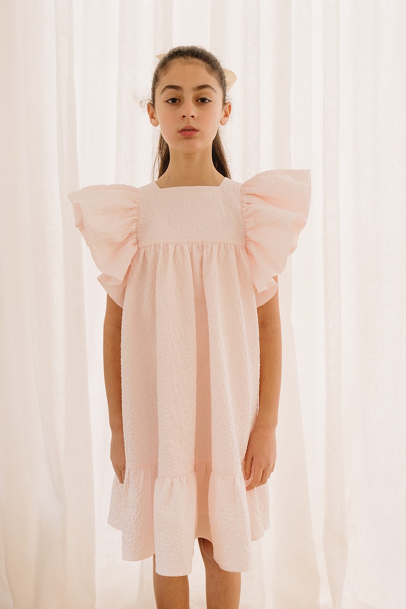 Ruffled matelassé dress | Petite Amalie  