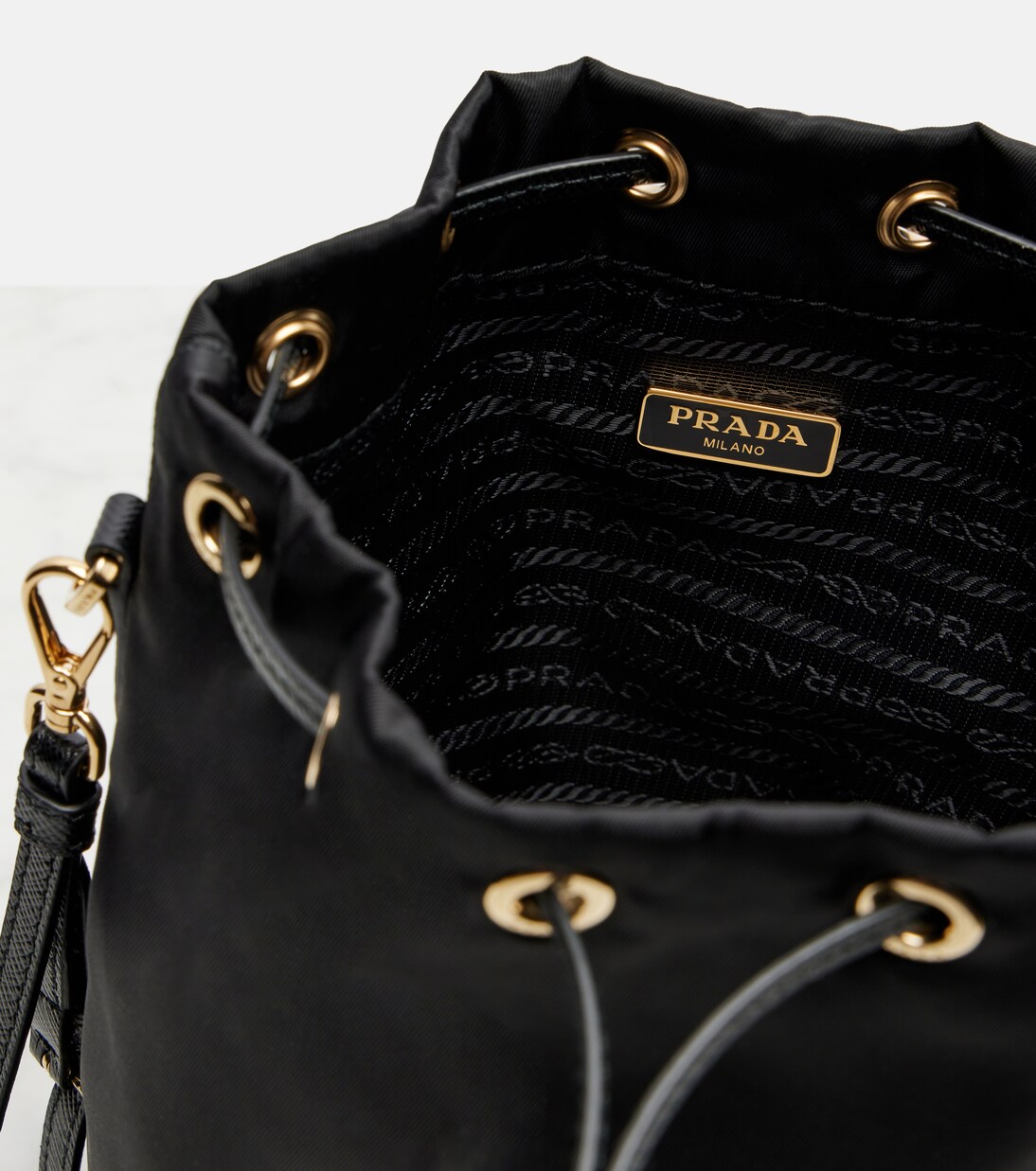 Re-Nylon leather-trimmed bucket bag | Prada