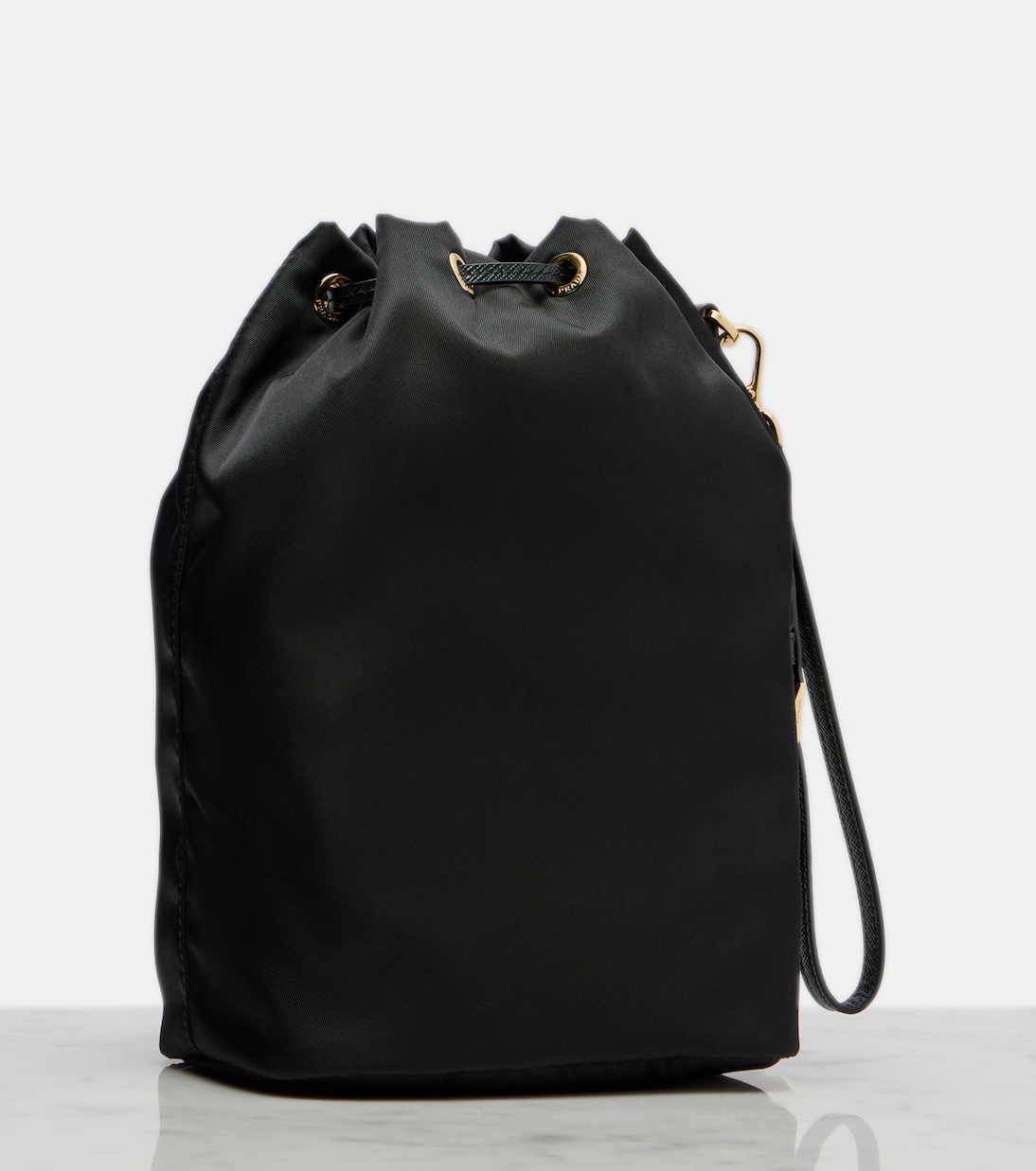 Re-Nylon leather-trimmed bucket bag | Prada