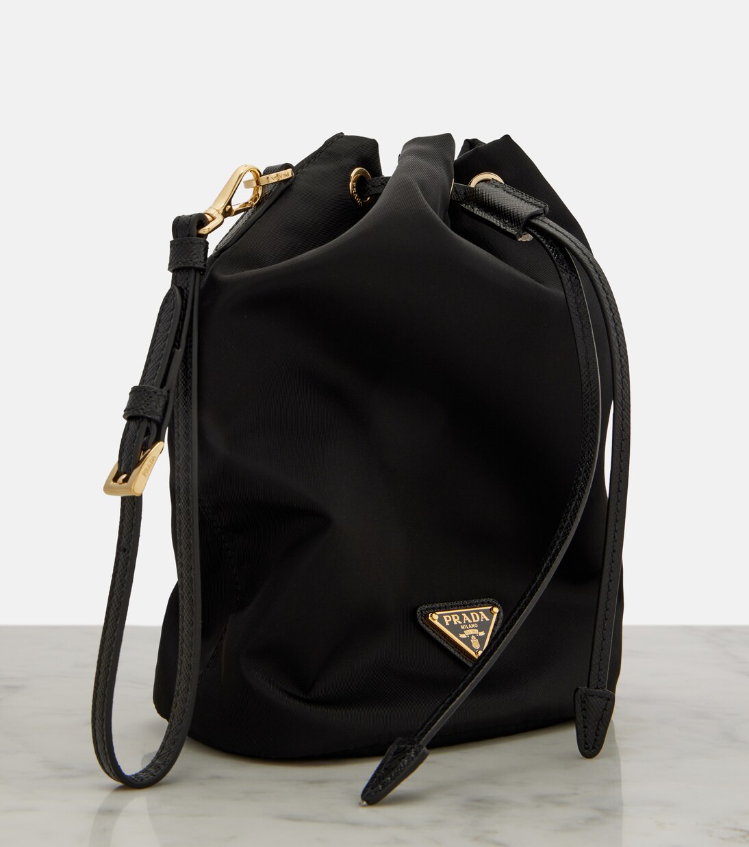 Re-Nylon leather-trimmed bucket bag | Prada