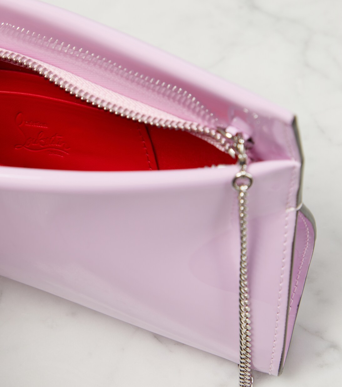 Loubitwist Small patent leather clutch | Christian Louboutin