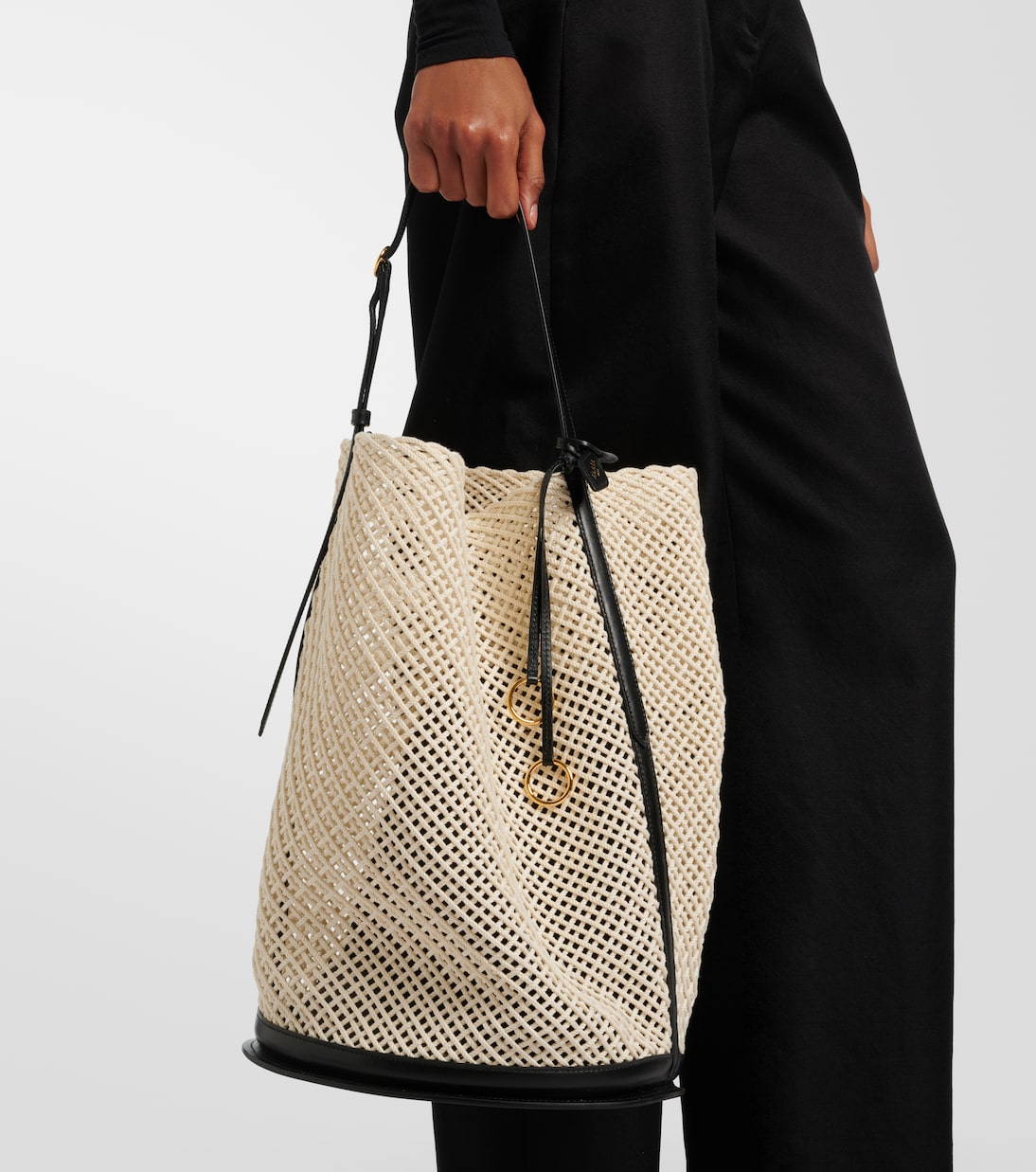 Hip Large leather-trimmed bucket bag | Alaïa