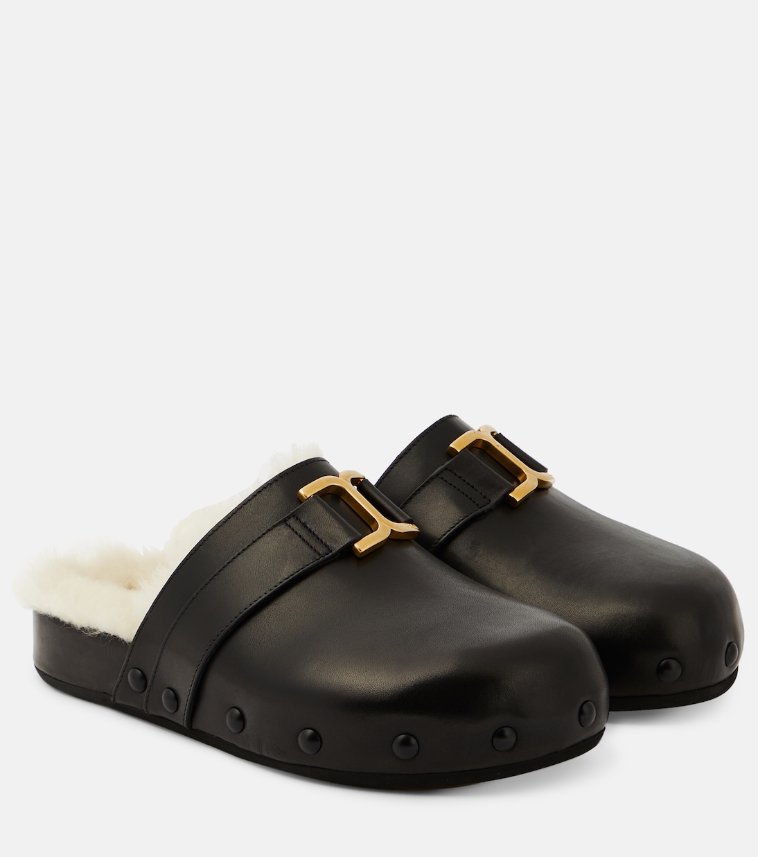 Marcie leather and shearling slippers | Chloé