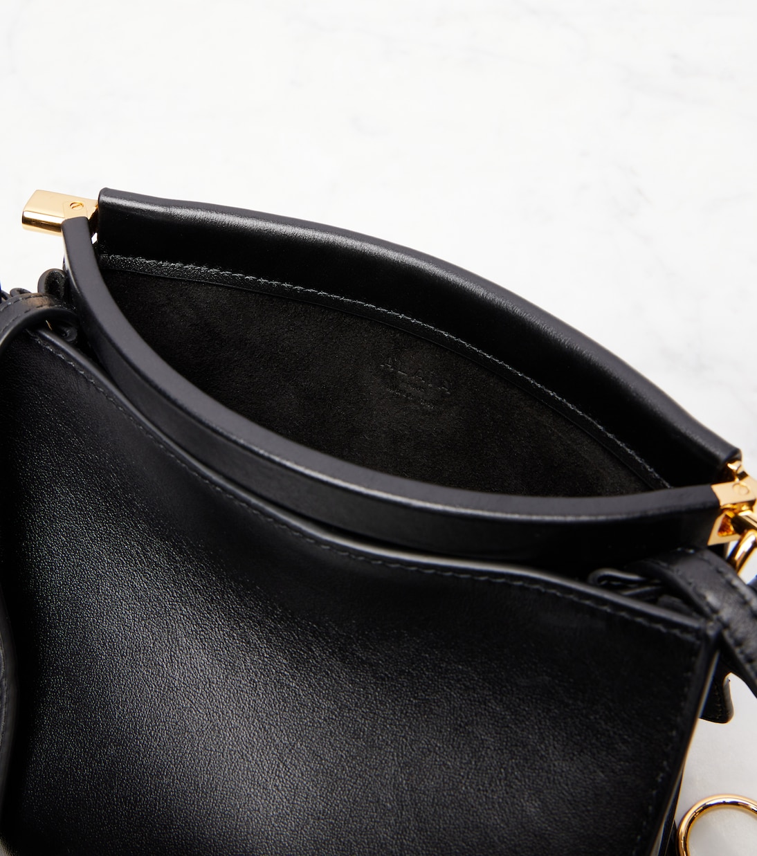 Le Click Small leather shoulder bag | Alaïa